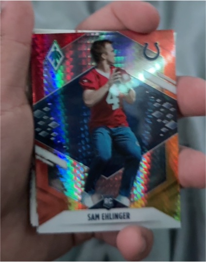 2021 Panini Phoenix #200 Sam Ehlinger Fire Burst Rookie — front