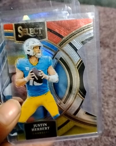 2023 Panini Select Premier Level #136 Justin Herbert — front