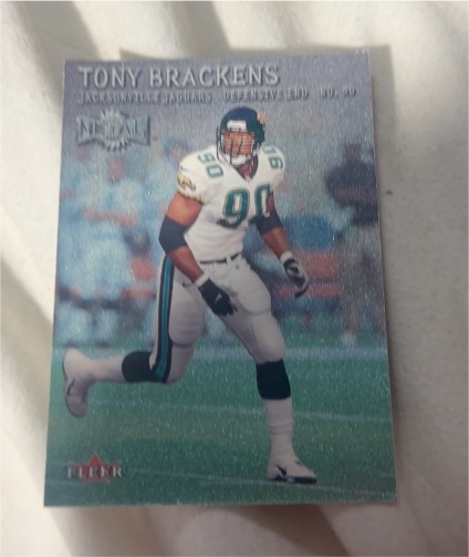 2000 Fleer Metal #96 Tony Brackens — front
