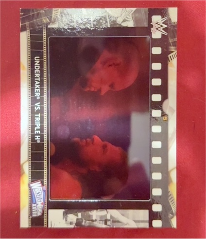 2021 Topps WWE Match Film Strip Relic Undertaker vs Triple H — front
