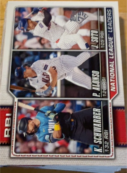 2026 Topps Series 1 #11 National League RBI Leaders Kyle Schwarber Pete Alonso Juan Soto — front