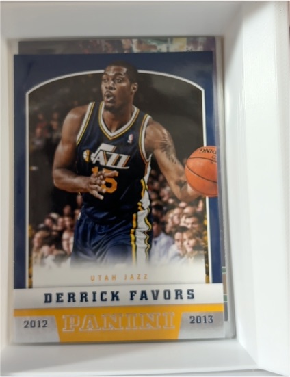2012-13 Panini #48 Derrick Favors — front