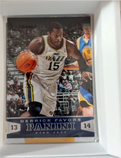 2013-14 Panini #89 Derrick Favors — front