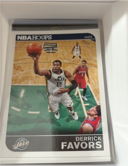 2014-15 Panini NBA Hoops #70 Derrick Favors — front