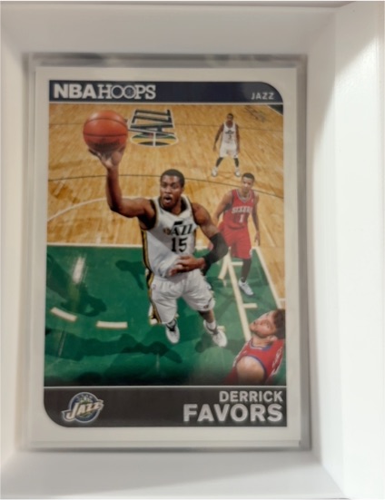 2014-15 Panini NBA Hoops #70 Derrick Favors — front