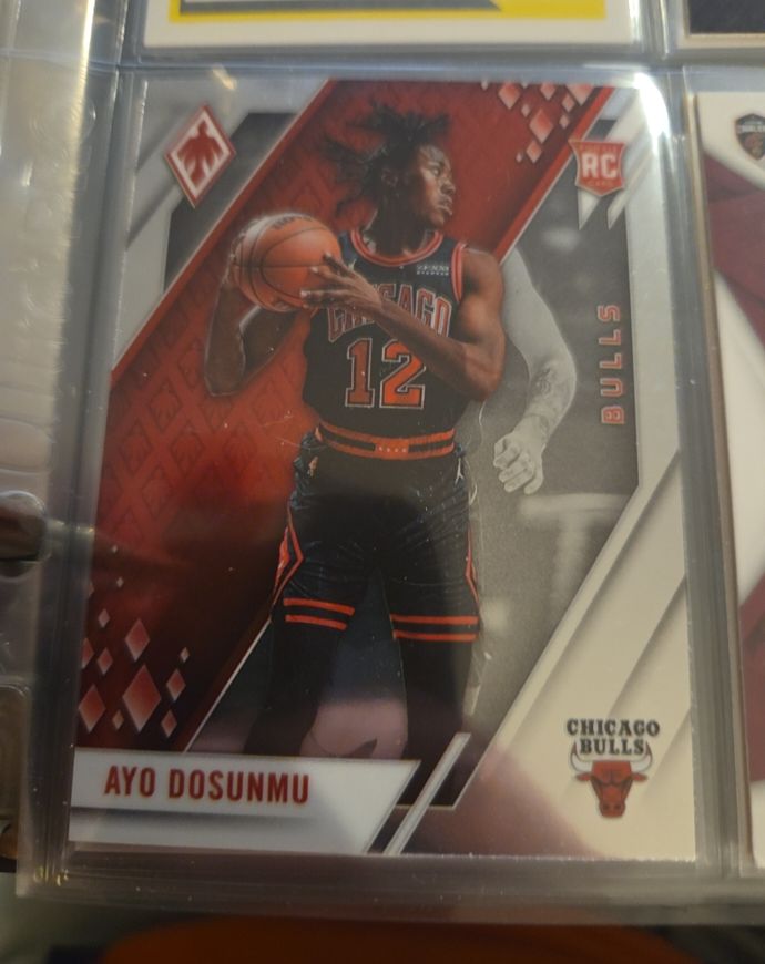 2021-22 Panini Chronicles Phoenix #673 Ayo Dosunmu — front
