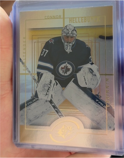 2021-22 Upper Deck Extended Series SPx 1999-2000 Retro #SPX-18 Connor Hellebuyck — front