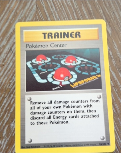 1999 Pokémon Base Set #85 Pokémon Center Trainer — front
