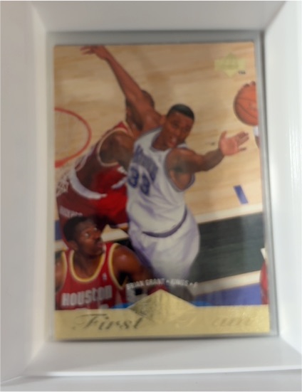 1995 Upper Deck First Team Rookie Grant Hill — front