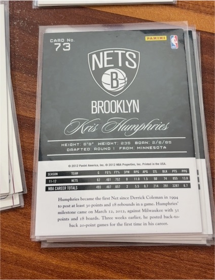 2012 Panini #73 Kris Humphries — front
