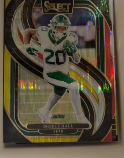 2024 Panini Select #111 Breece Hall Premier Level Green Yellow Shock Prizm Jets — front