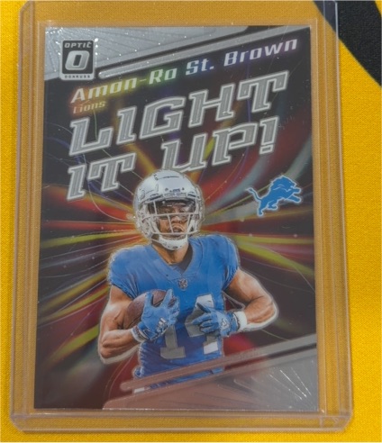 2023 Panini Donruss Optic #LU-AB Amon-Ra St. Brown Light It Up! — front