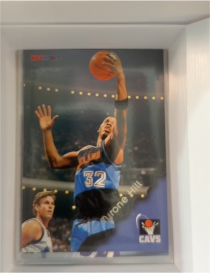 1996-97 Hoops #28 Tyrone Hill — front