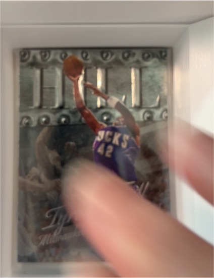 1998 Skybox Metal Universe #103 Tyrone Hill — front