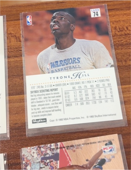 1991 SkyBox #74 Tyrone Hill — front