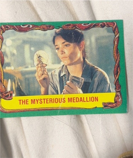 1981 Topps Raiders of the Lost Ark #24 The Mysterious Medallion — front