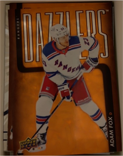 2025-26 Upper Deck #DZ-42 Adam Fox Dazzlers Orange — front