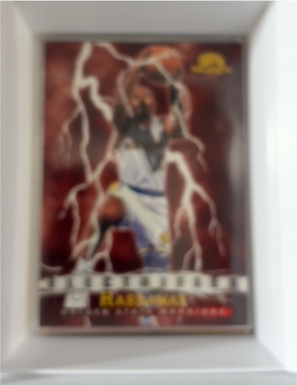 1995-96 Skybox Premium Electrified #284 Tim Hardaway — front