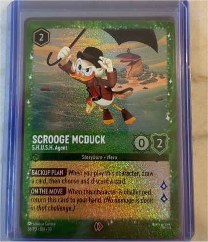 Lorcana #36 Scrooge McDuck S.H.U.S.H. Agent Glimmer Foil Promo — front