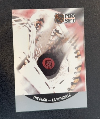 1990 Pro Set #705 The Puck - La Rondelle — front