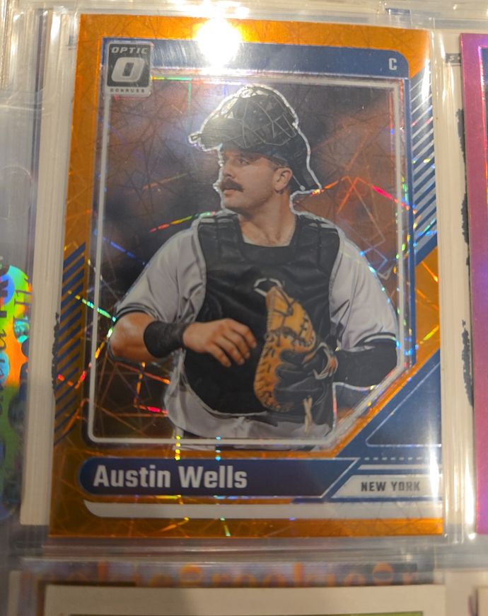 2024 Panini Donruss Optic #59 Austin Wells Orange Velocity Prizm — front