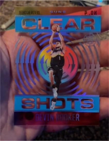 2020-21 Panini Illusions Clear Shots #4 Devin Booker — front