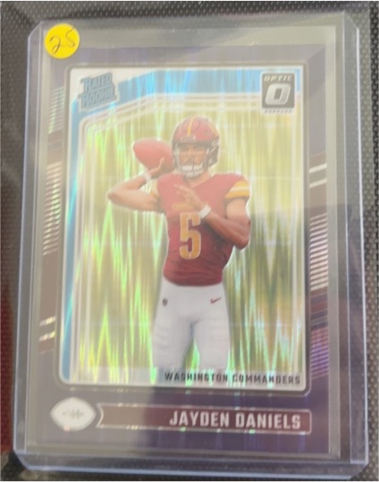 2024 Donruss Optic #248 Jayden Daniels Purple Shock Prizm Rated Rookie — front