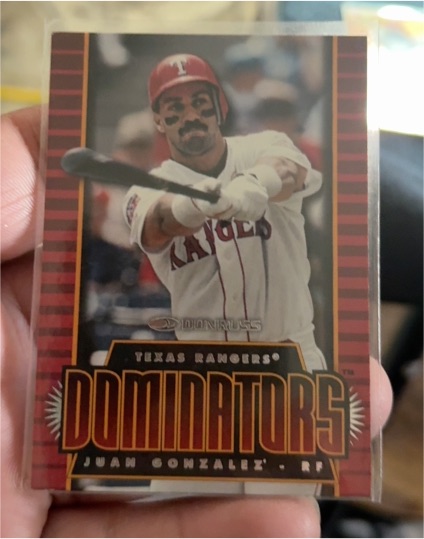 1997 Donruss Dominators #1 Juan Gonzalez — front