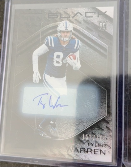 2025 Panini Black #113 Tyler Warren Rookie Autograph — front