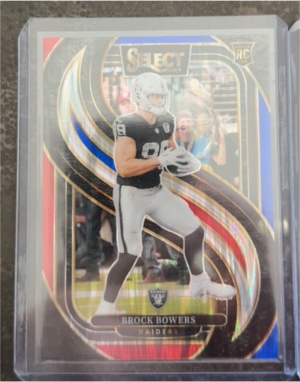 2024 Panini Select #118 Brock Bowers Premier Level Red White Blue Prizm Shock Rookie — front