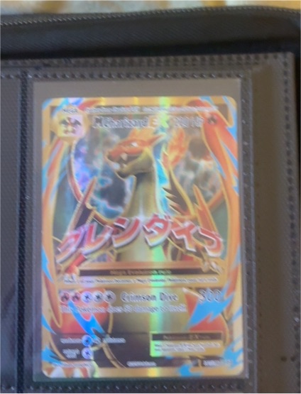2014 Pokémon XY Evolutions #101 M Charizard EX — front