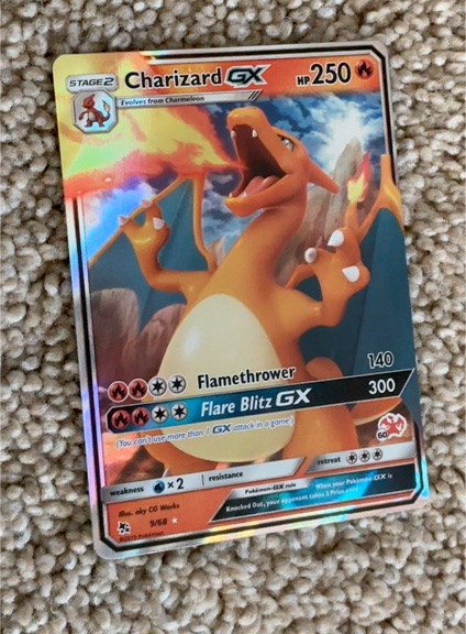 2017 Pokémon Sun & Moon Hidden Fates #9 Charizard GX — front