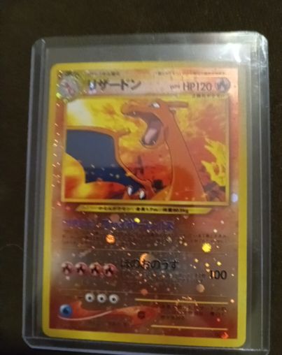 1996 Pokémon #006 Charizard Neo Premium File 2 — front