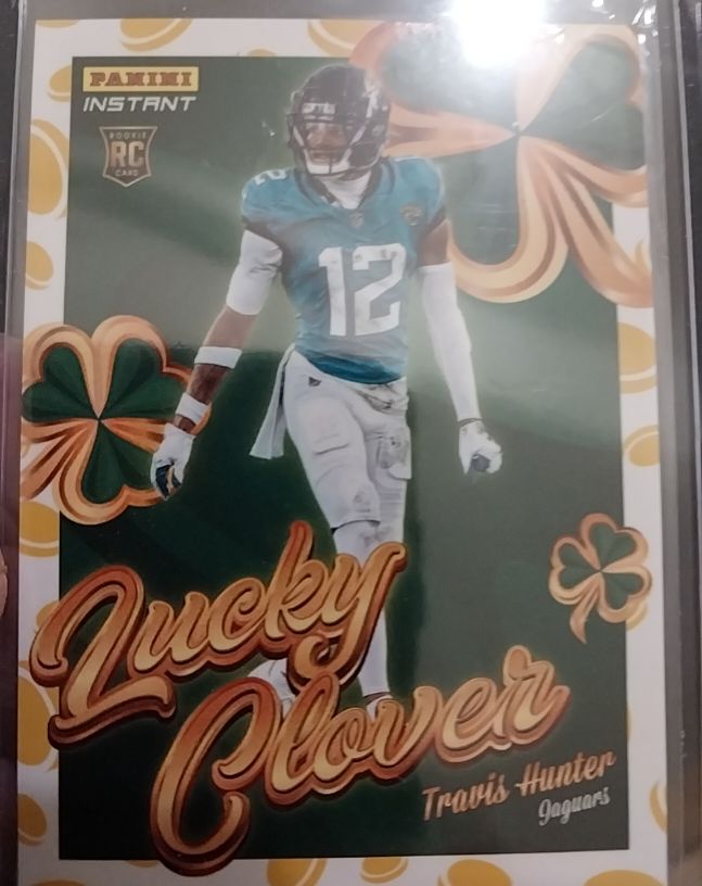 2025 Panini Instant #15 Travis Hunter Lucky Clover Rookie Jaguars — front