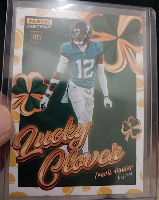 2025 Panini Instant #15 Travis Hunter Lucky Clover Rookie — front