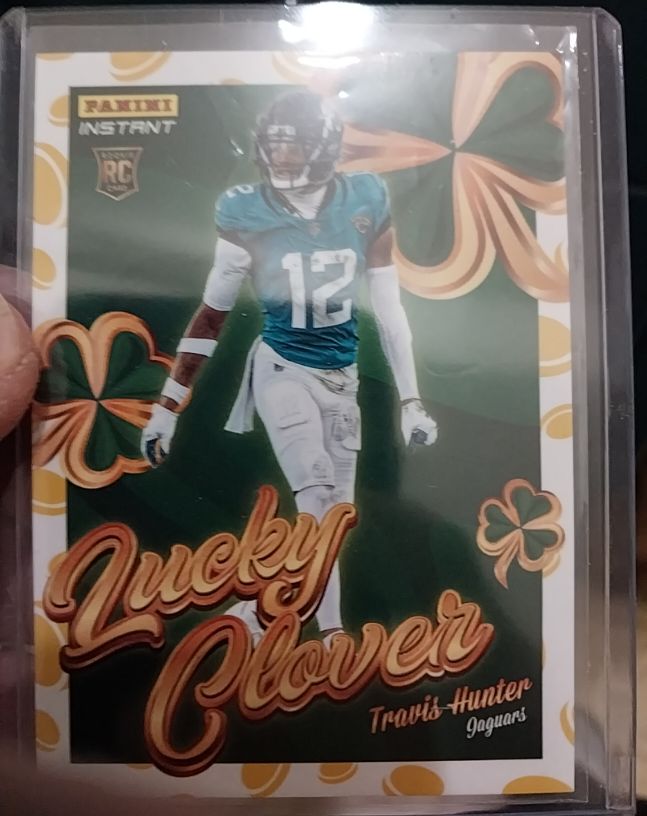 2025 Panini Instant #15 Travis Hunter Lucky Clover Rookie — front