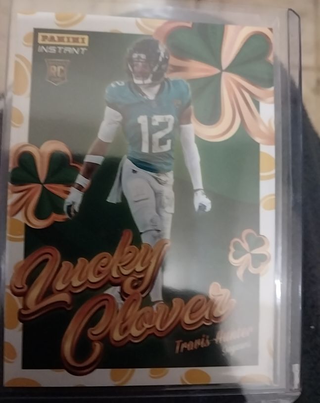 2025 Panini Instant #15 Travis Hunter Lucky Clover Rookie — front