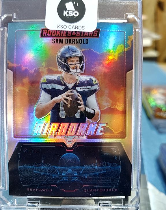 2025 Panini Rookies & Stars #19 Sam Darnold Airborne Silver Prizm — front
