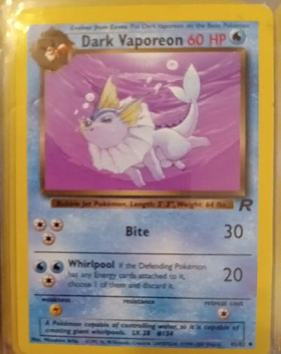 1999 Pokémon Team Rocket #45 Dark Vaporeon — front