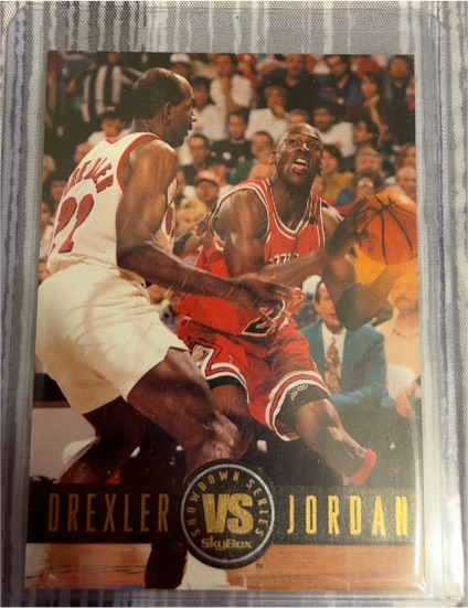 1994 Skybox Showdown Series #SS11 Michael Jordan vs Clyde Drexler — front