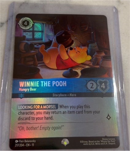Disney Lorcana Winterspell #151 Winnie the Pooh Hungry Bear — front