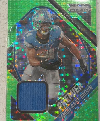 2025 Panini Prizm Premier Jerseys #PJY-ASB Amon-Ra St. Brown — front