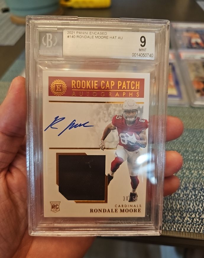 2021 Panini Encased #140 Rondale Moore Rookie Cap Patch Auto — front
