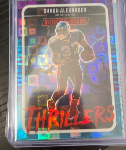 2025 Panini Rookies & Stars #7 Shaun Alexander Thrillers Red Plaid — front