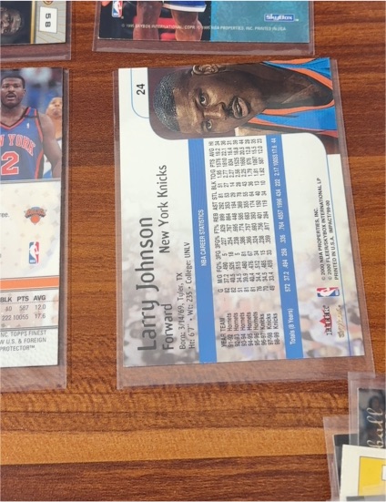 1999-00 SkyBox Impact #24 Larry Johnson — front