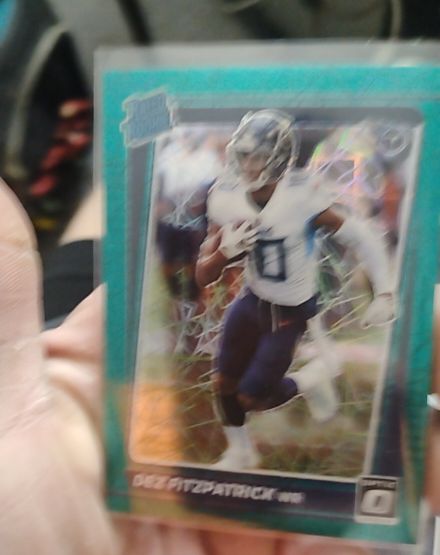 2021 Donruss Optic #236 Dez Fitzpatrick Green Velocity Prizm Rated Rookie — front