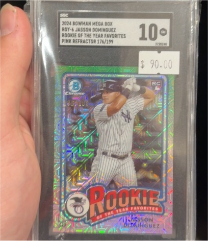 2024 Bowman Mega Box #ROY-6 Jasson Dominguez Rookie of the Year Favorites Pink Refractor 176/199 — front