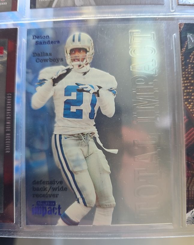 1997 Skybox Impact Total Impact #9 Deion Sanders — front