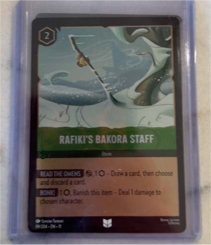 Lorcana Winterspell #99 Rafiki's Bakora Staff — front