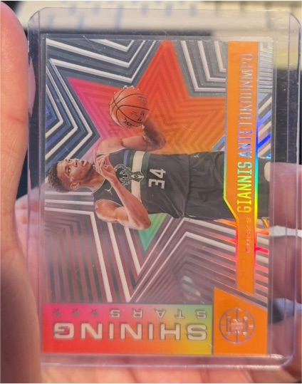 2020-21 Panini Illusions #11 Giannis Antetokounmpo Shining Stars Orange — front